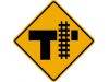 T intersection with railroad crossing